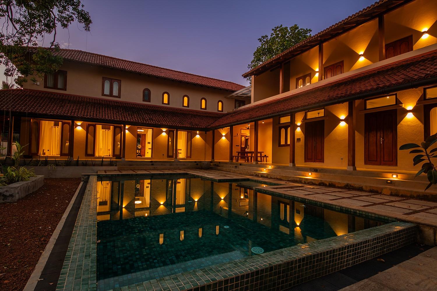 Origin Balapitiya villa and pool beautifully illuminated at evening