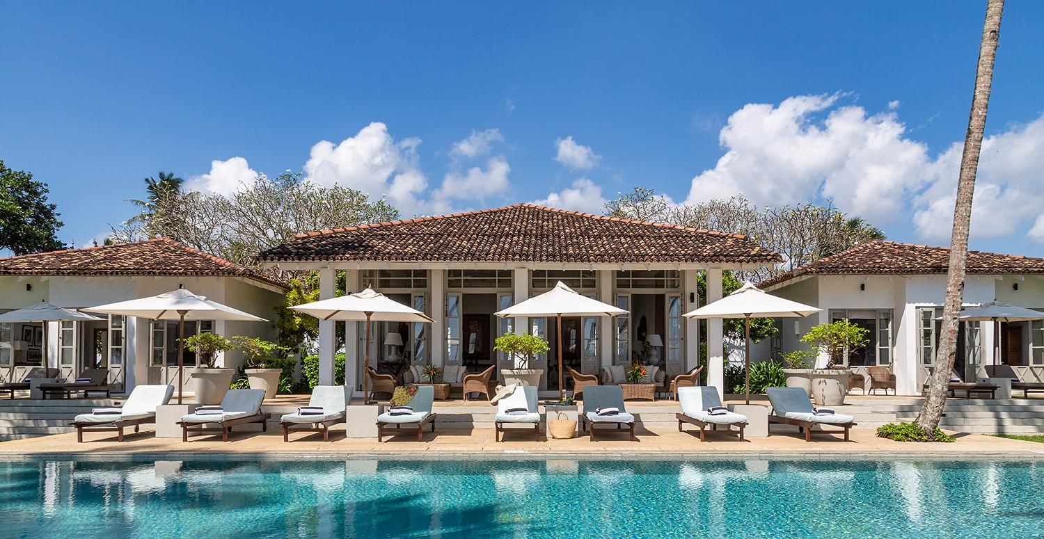 Wide exterior view of Habaraduwa House with pool and tropical garden, Sri Lanka