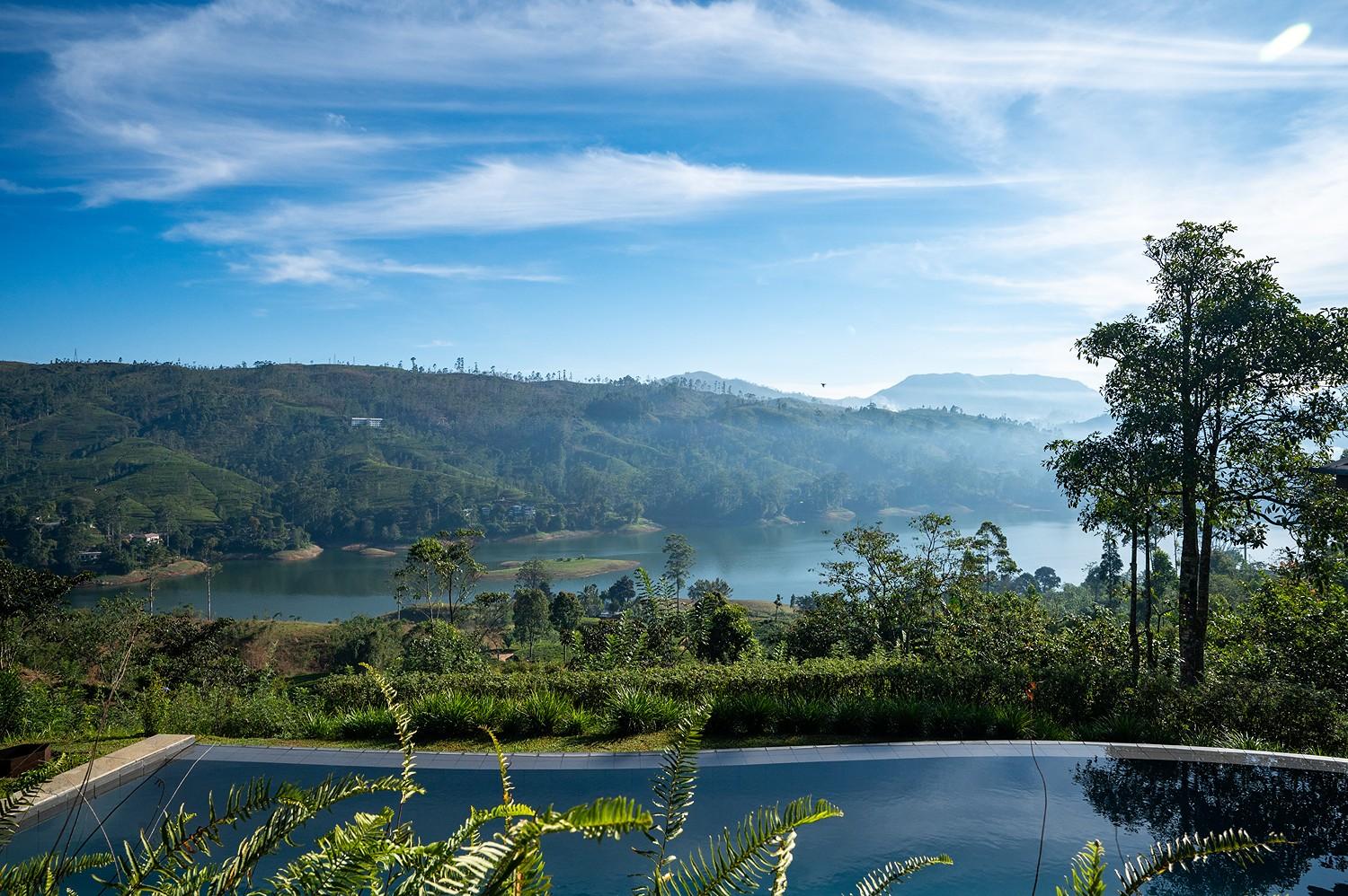 Camellia Hills pool with Castlereagh Reservoir reflection and hills beyond, Dickoya