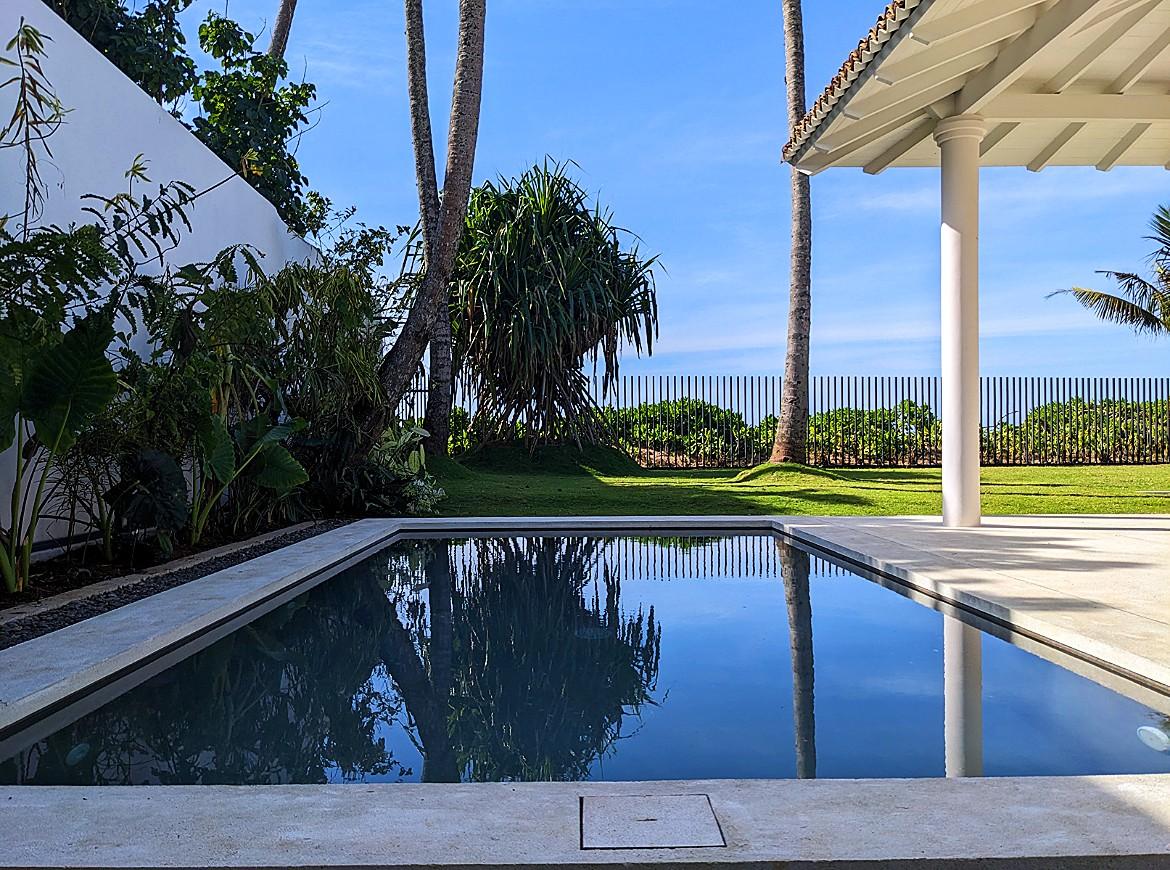 Salt and Stone pool with colonial colonnades and tropical garden, Ahangama, Sri Lanka