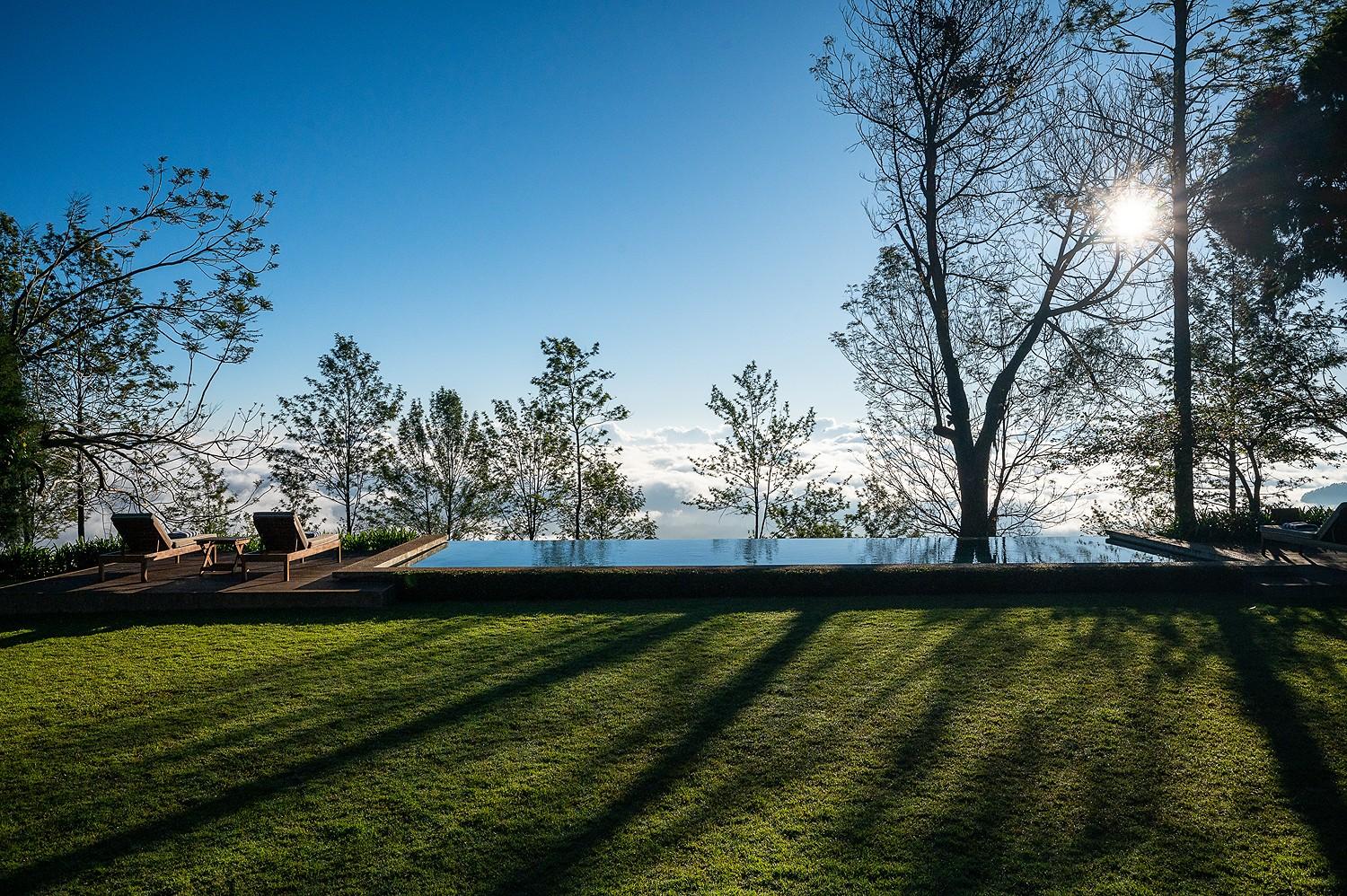 Pool and lawn with afternoon shadows, Goatfell Kandapola