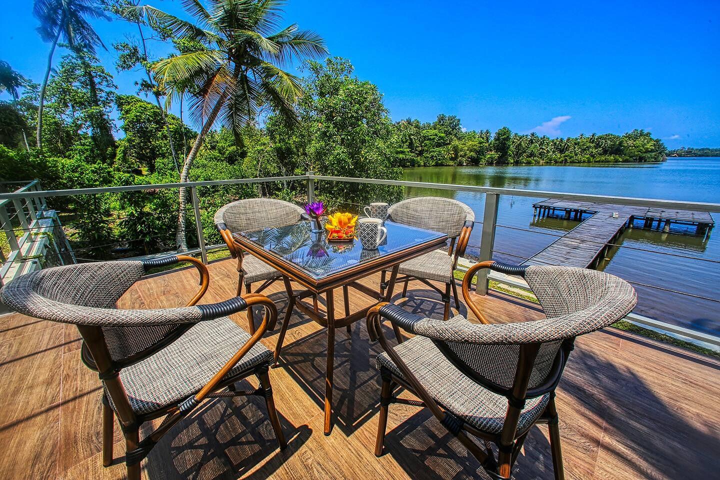 Jetty deck with river view and chairs, Niche Hikkaduwa