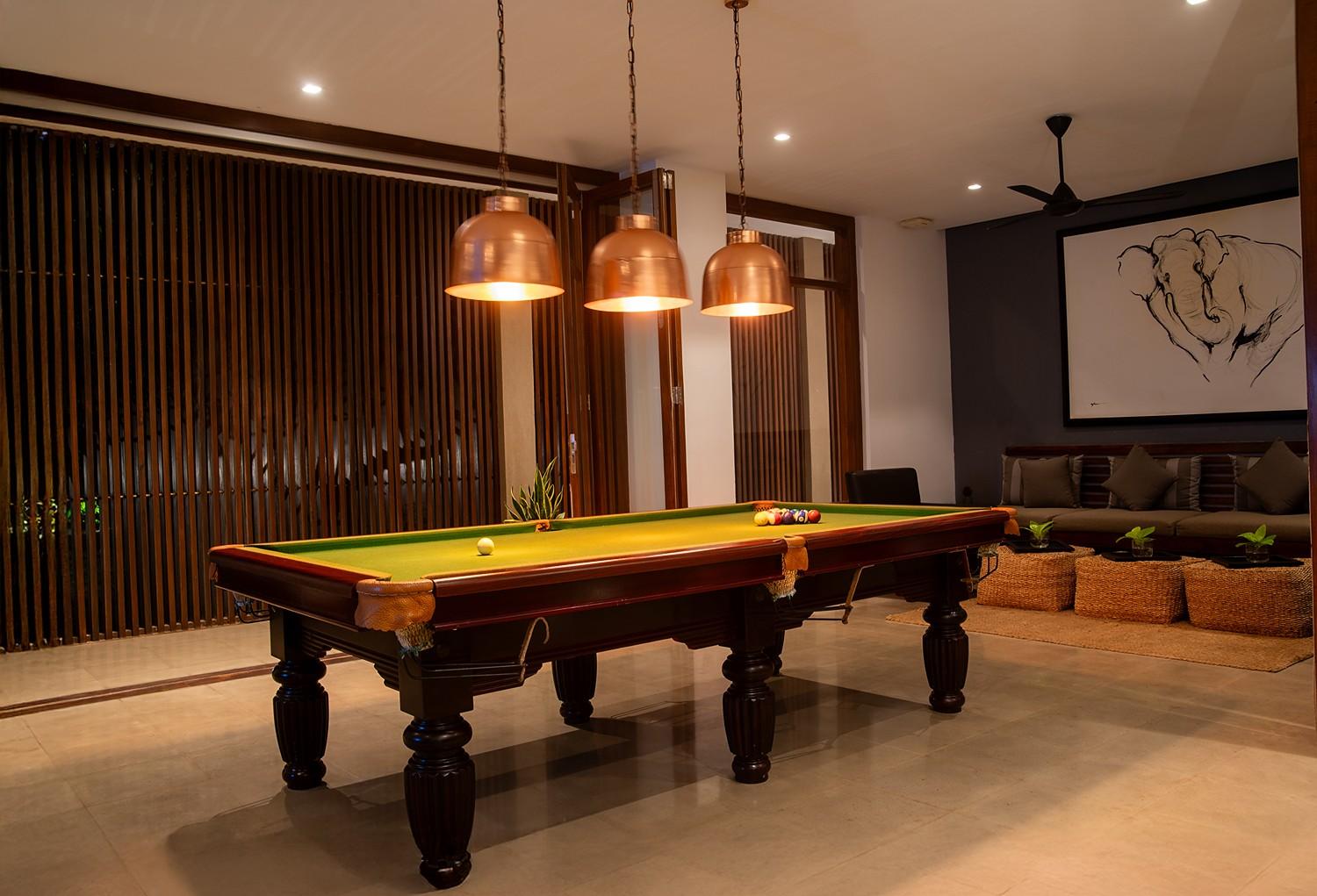 Billiard table lit, The Villa by CC Wadduwa